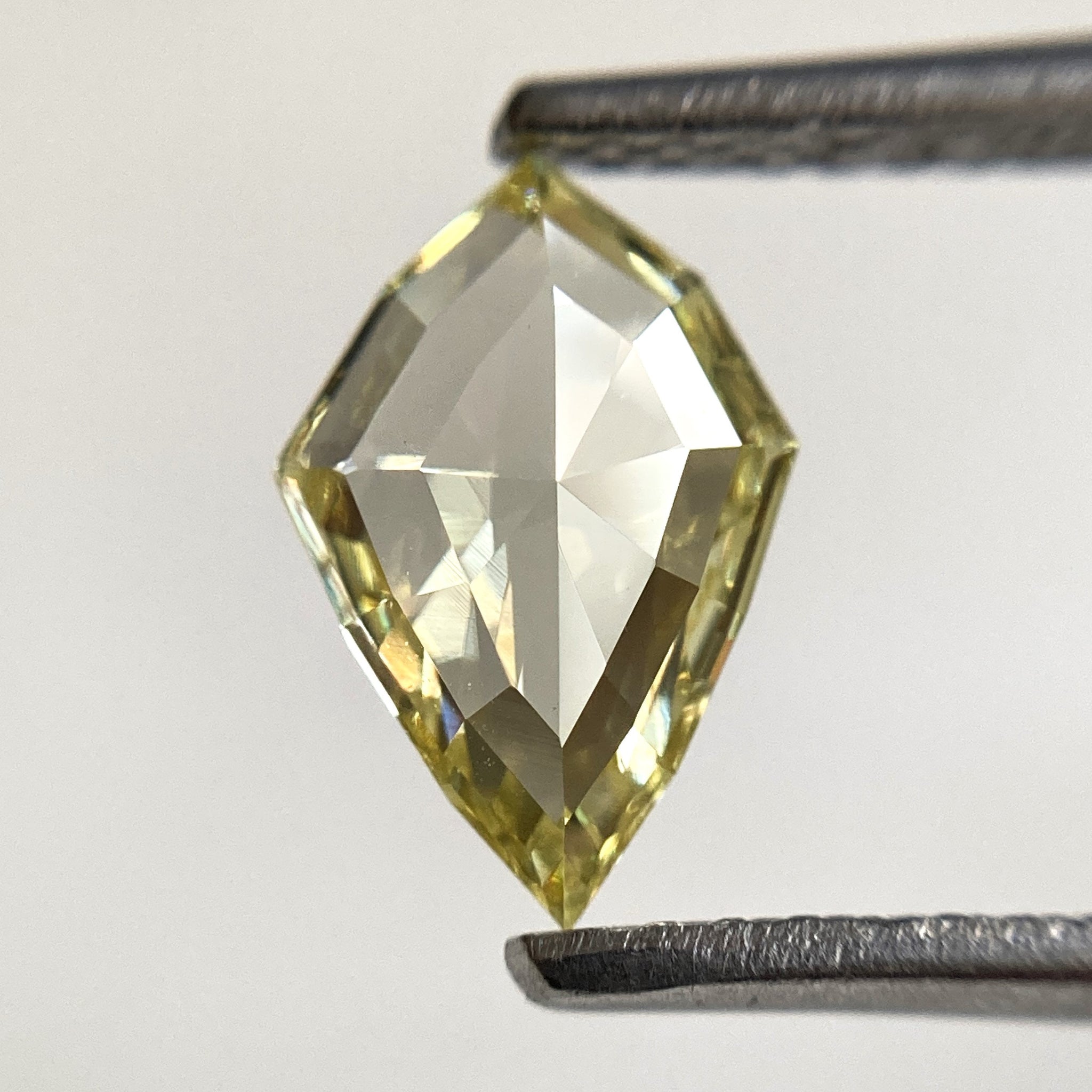 0.73 Ct Modified Pear shape Natural loose diamond, 8.97 mm x 6.10 mm x 2.10 mm Fancy light yellow natural diamond, SJStock-08