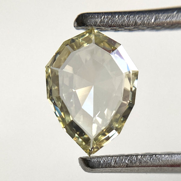 0.31 Ct Modified Pear cut Natural loose diamond, 6.94 mm x 5.01 mm x 1.13 mm Fancy light yellow SI natural diamond, SJStock-10